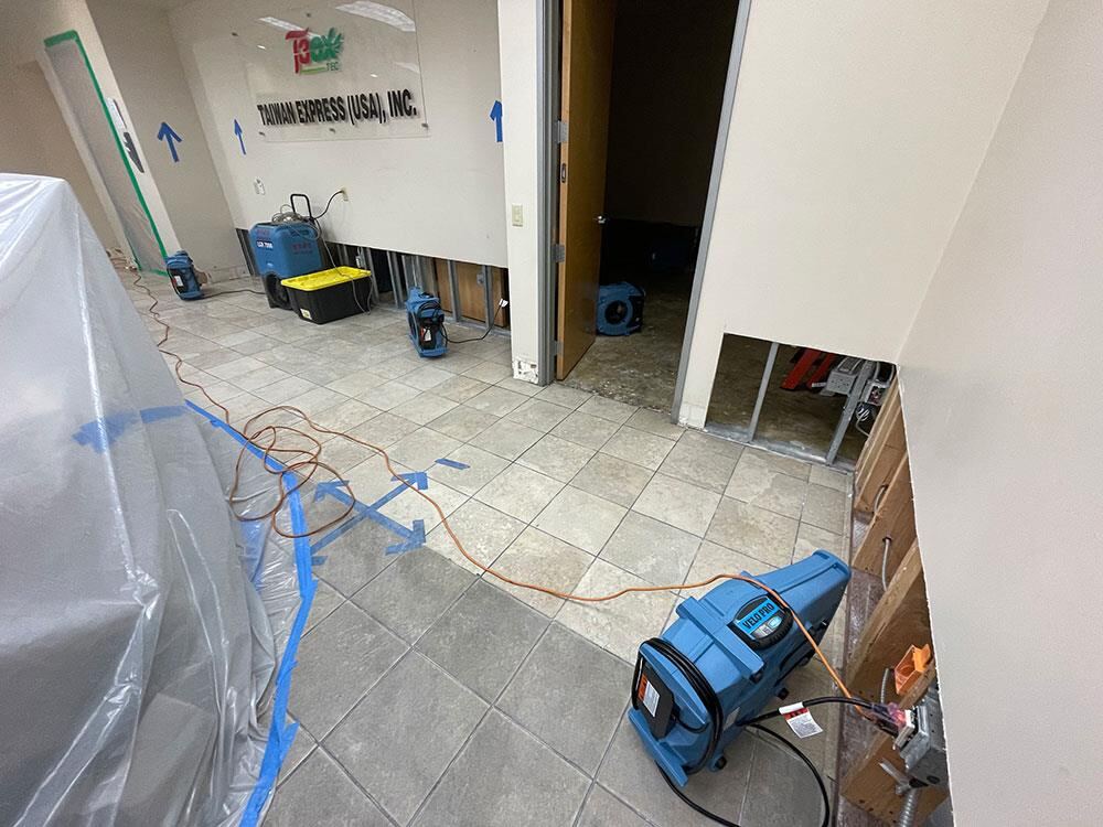 Office entrance separated from the work zone with containment